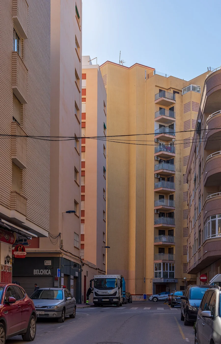 Calle Goleta street surrounded by apartment buildings, Playa del Cura, Torrevieja, Spain, 2022 January