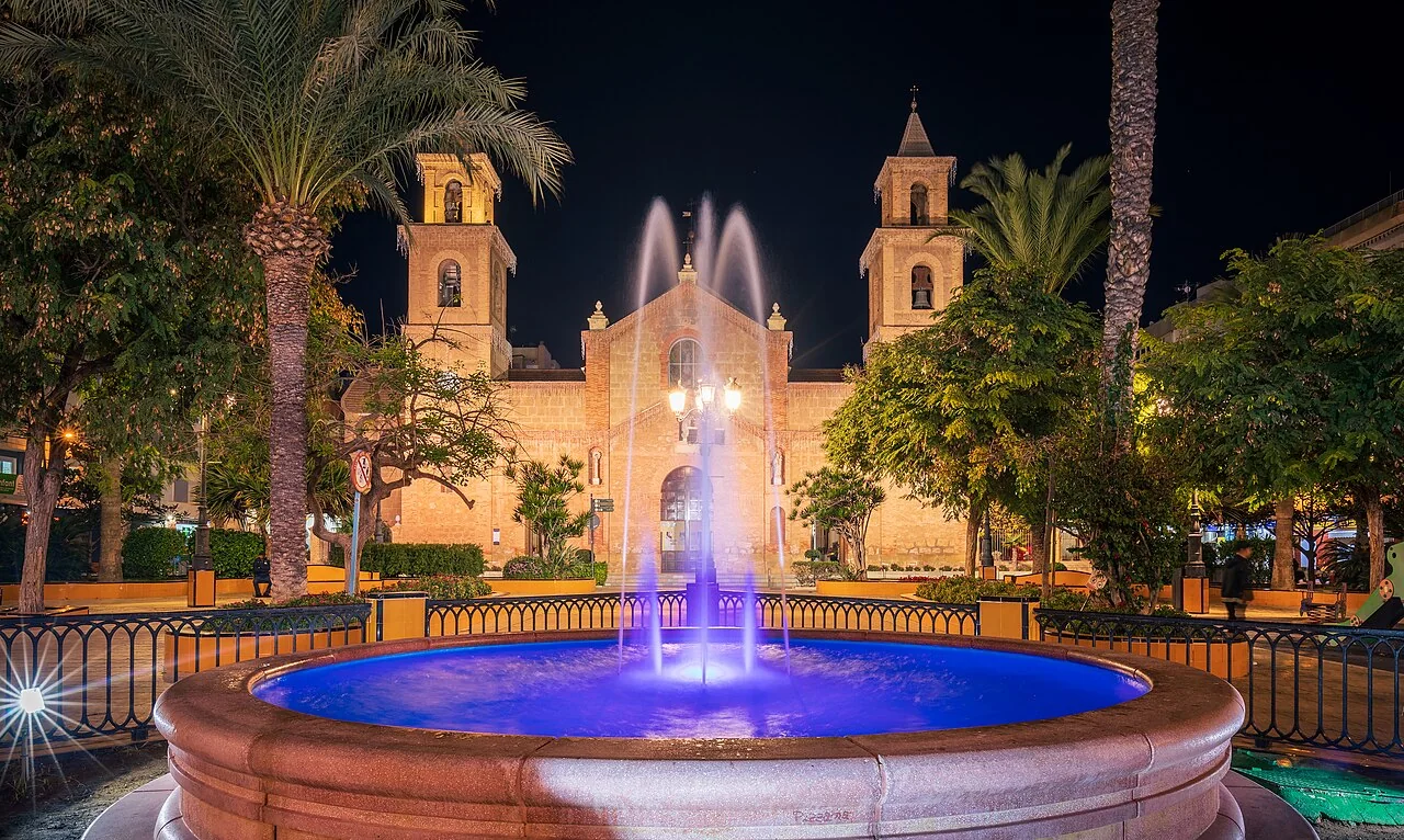 Fountain in Plaza de la Constitución and Iglesia Arciprestal de la Inmaculada Concepción in Torrevieja, Alicante, Spain, 2022 January